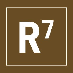 A white letter "R" followed by the number "7" in superscript is centered within a white square border on a brown background.